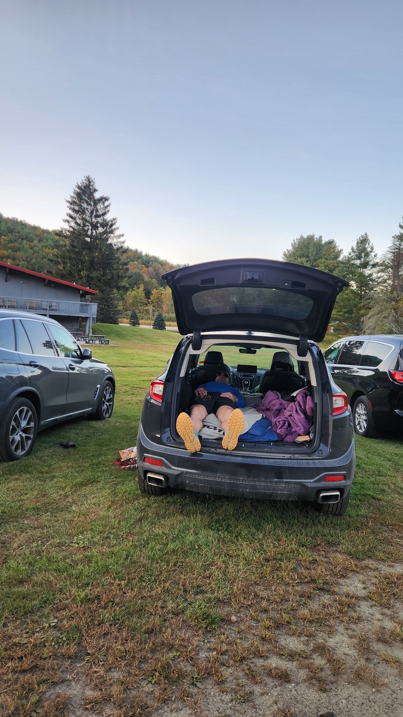 IronHike Mountain Athlete resting in the back of a car between laps, Mohawk Mountain Cornwall CT