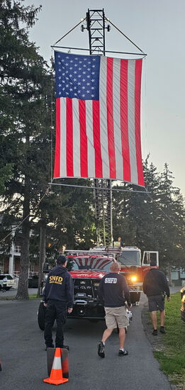 View Photos from the top of the ladder truck in new tab